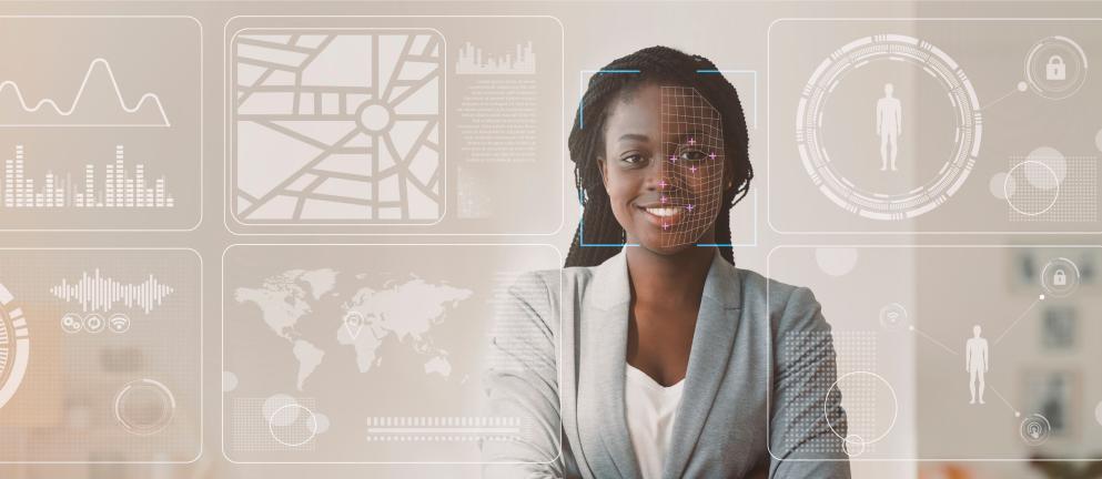 African American businesswoman with info on virtual display